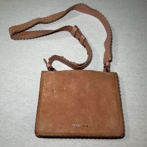 Coccinelle suede shoulder bag in pale pink with a scalloped shoulder strap, Boho